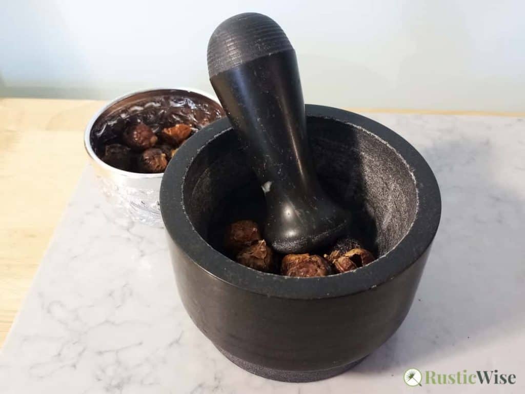 RusticWise, soap nuts for hair, grinding soap nuts with a mortar and pestle