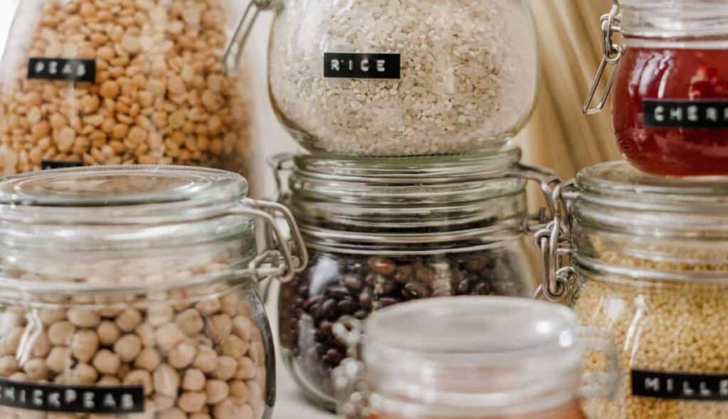 diy home organization tricks, repurpose glass jars