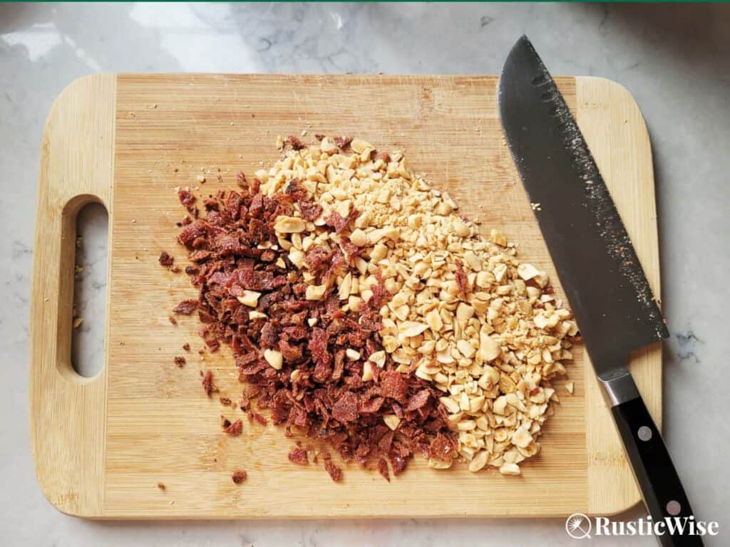 RusticWise, peanut butter bacon bread, chopped pieces of peanuts and bacon on cutting board